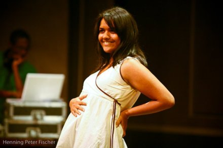 Madhuri Shekar, performing her own monologue of a woman that pretends to be pregnant
